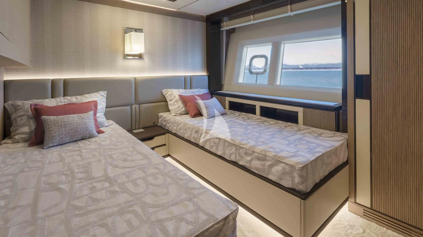 a couple of beds in a room aboard FOUR JOYS Yacht for Sale