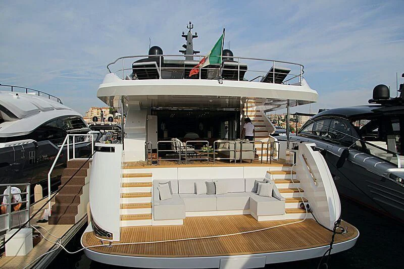 a boat docked at a pier aboard FOUR JOYS Yacht for Sale