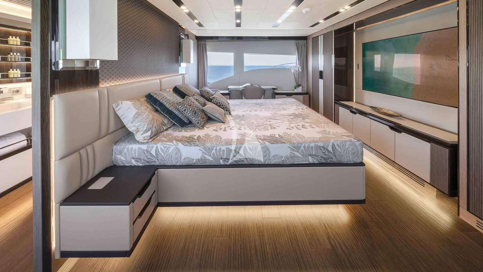 a large bedroom with a large bed aboard FOUR JOYS Yacht for Sale