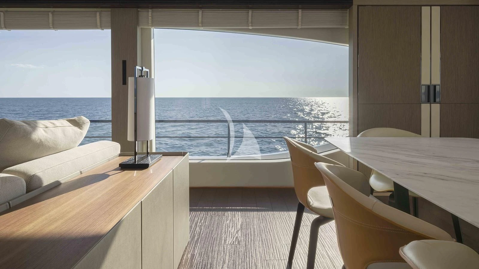 a room with a table and chairs aboard FOUR JOYS Yacht for Sale