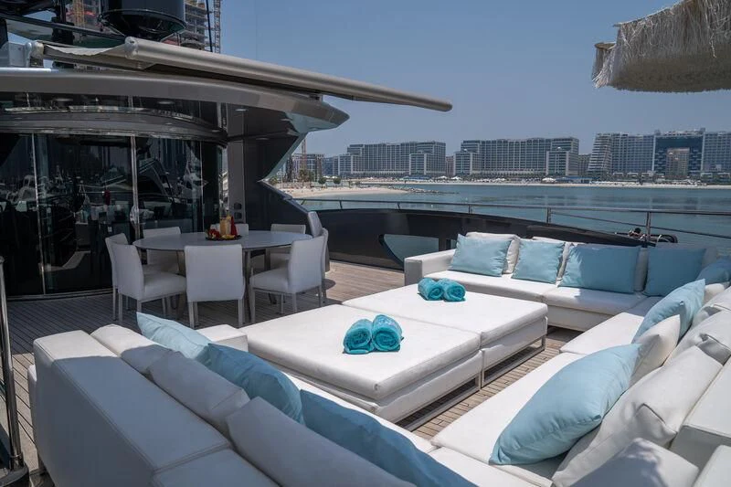 a room with a view of a city and a pool aboard BABYLON Yacht for Sale