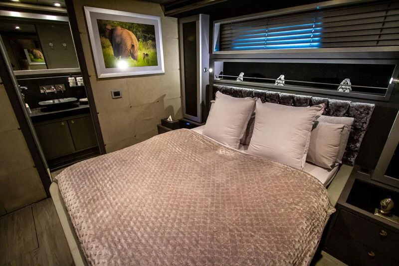 a bed with pillows aboard BABYLON Yacht for Sale
