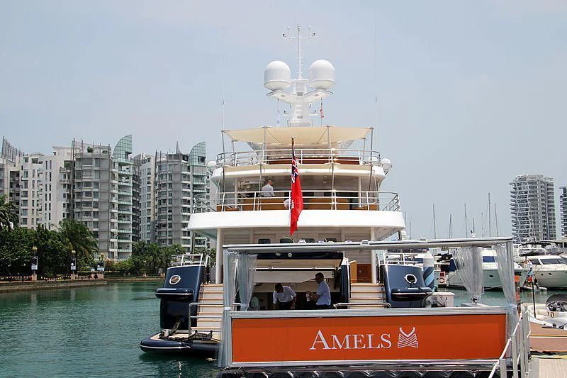 a boat with a large white tower aboard LA FAMILIA Yacht for Sale