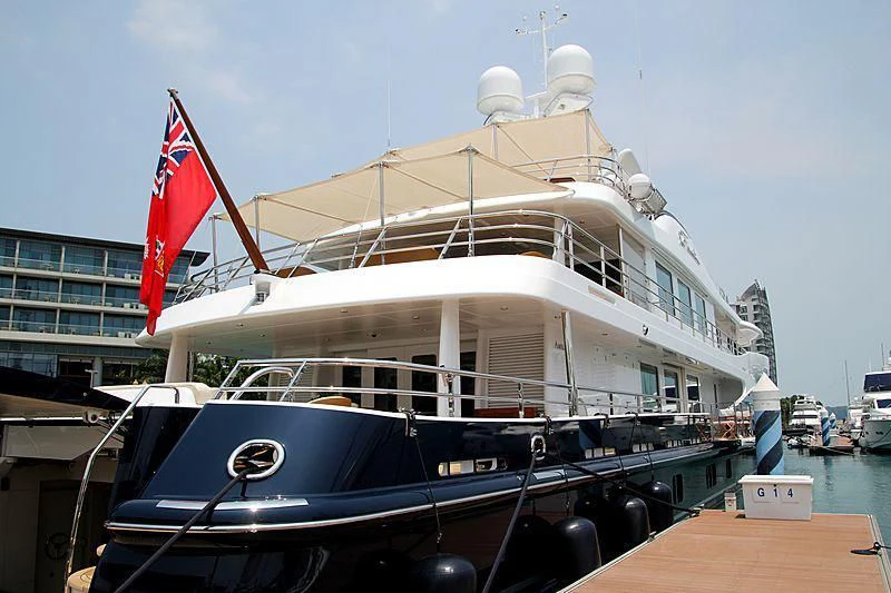 a boat docked at a pier aboard LA FAMILIA Yacht for Sale