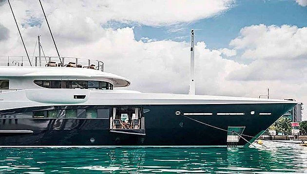 a large white boat in the water aboard LA FAMILIA Yacht for Sale