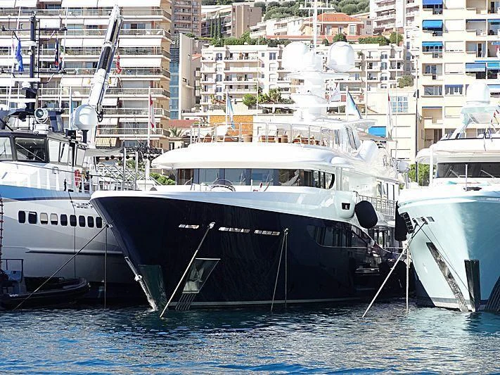 a group of boats in a harbor aboard LA FAMILIA Yacht for Sale