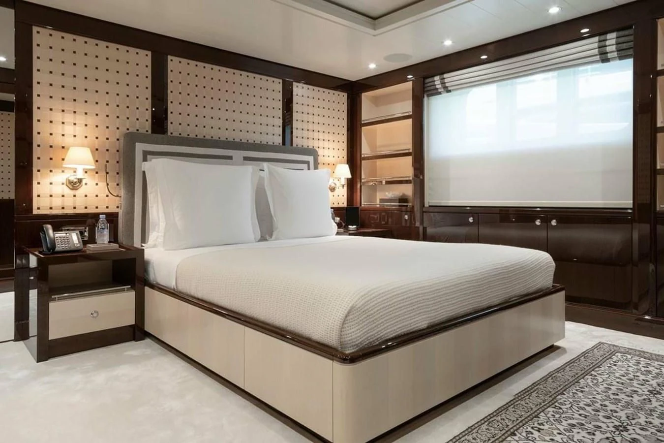 a large bed in a hotel room aboard LA FAMILIA Yacht for Sale