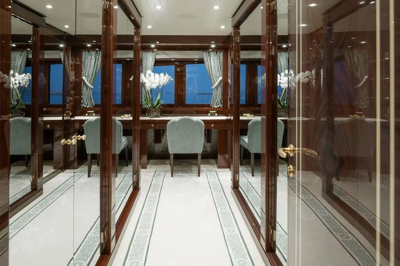a room with a glass wall aboard LA FAMILIA Yacht for Sale