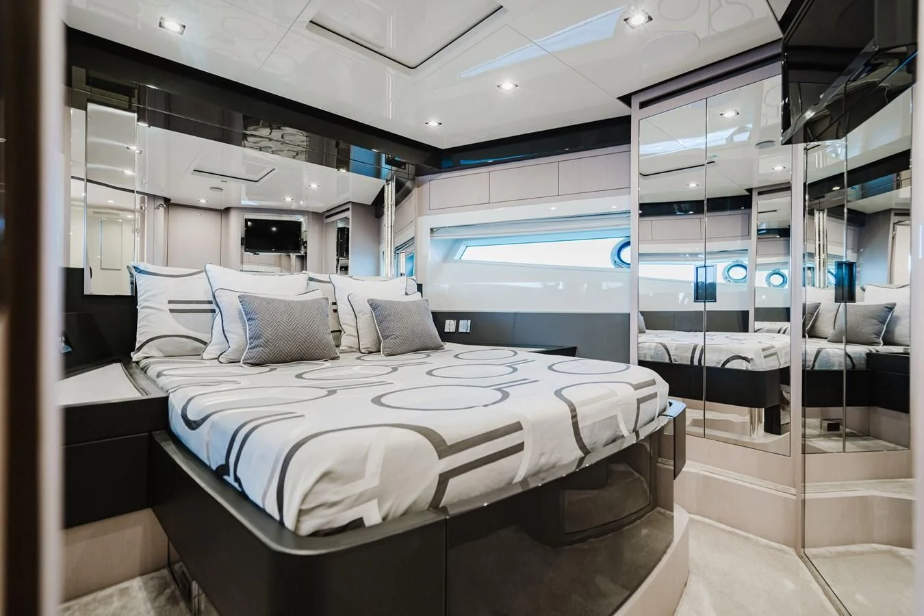 a bed in a room aboard BABY PEARL Yacht for Sale
