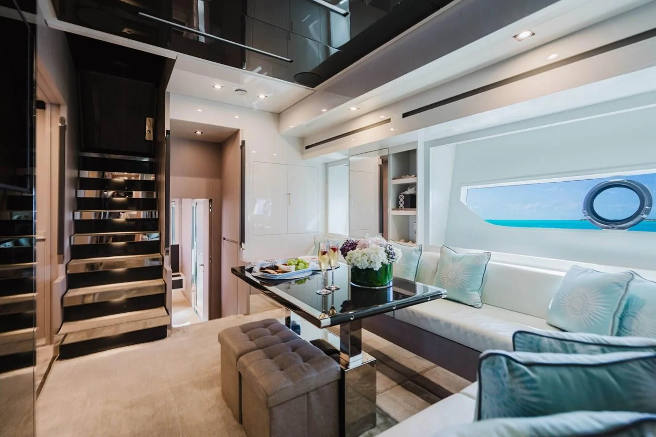 a room with a table and chairs aboard BABY PEARL Yacht for Sale