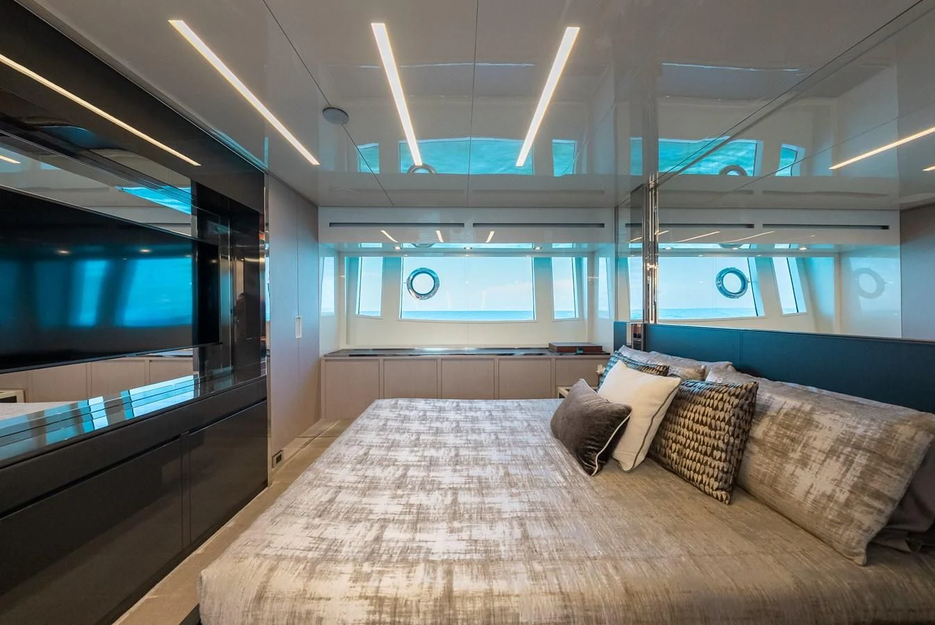 a large bed in a room aboard BABY PEARL Yacht for Sale