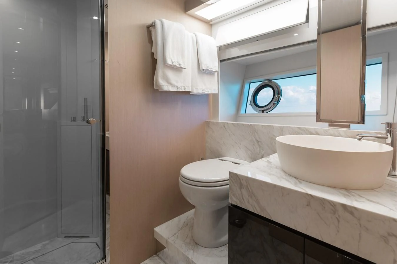 a bathroom with a sink toilet and bathtub aboard BABY PEARL Yacht for Sale