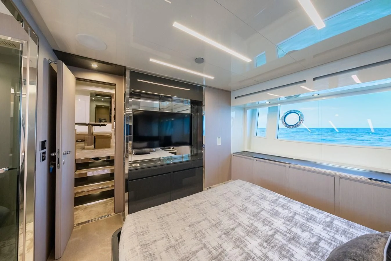 a room with a bed and a window aboard BABY PEARL Yacht for Sale
