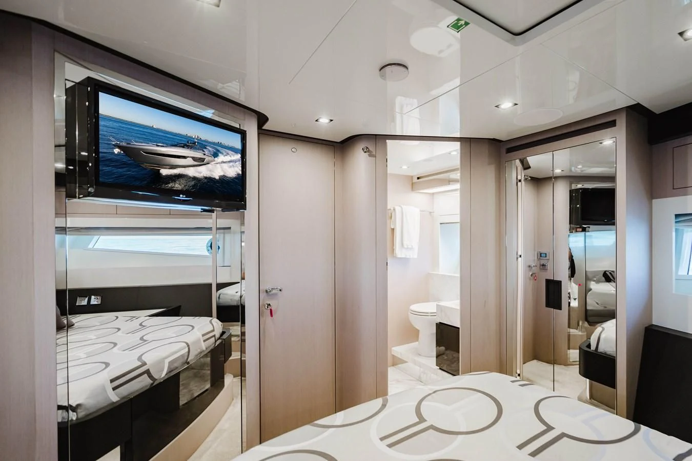 a room with a large mirror and a bed aboard BABY PEARL Yacht for Sale