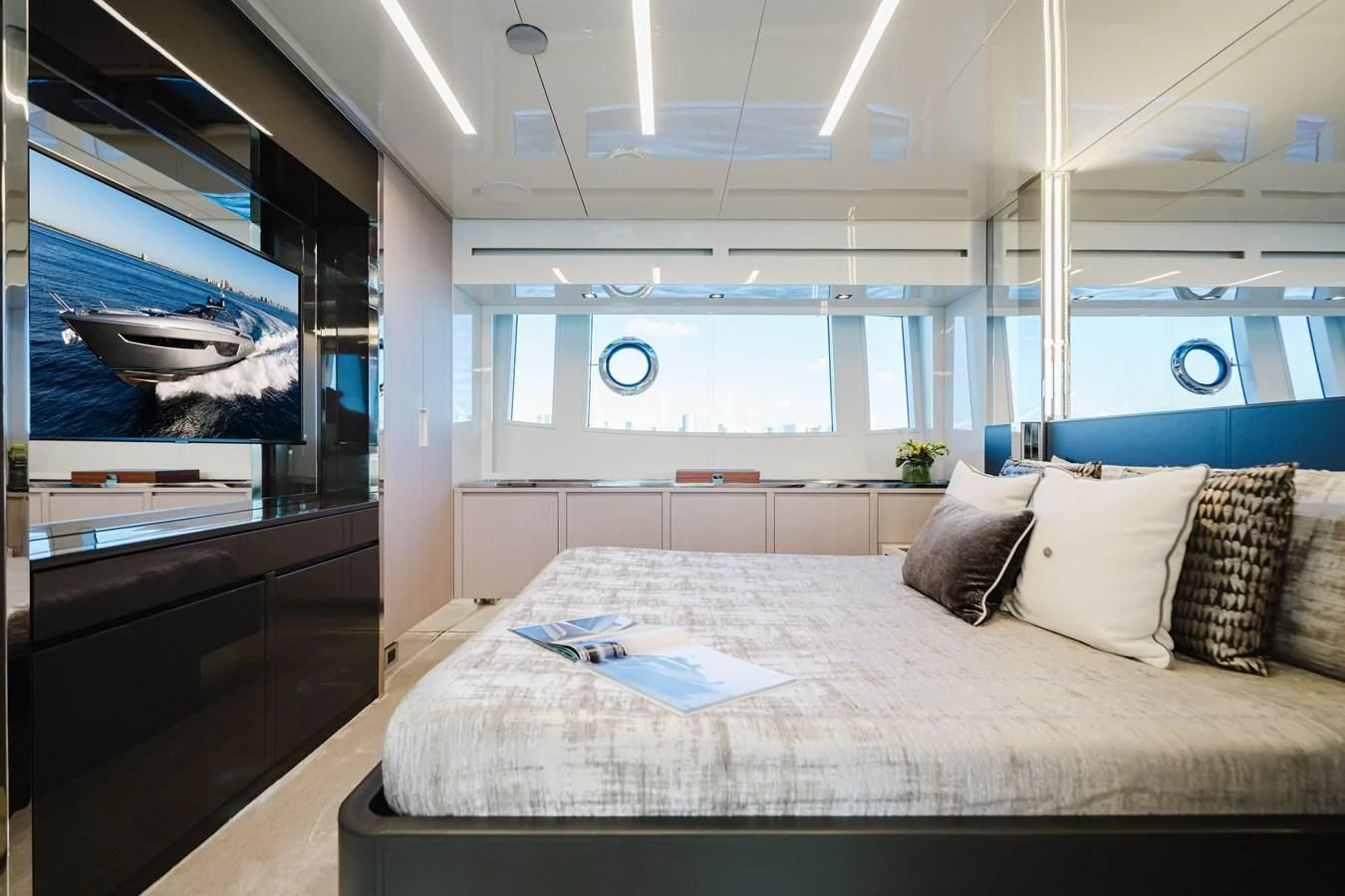 a bed in a room aboard BABY PEARL Yacht for Sale