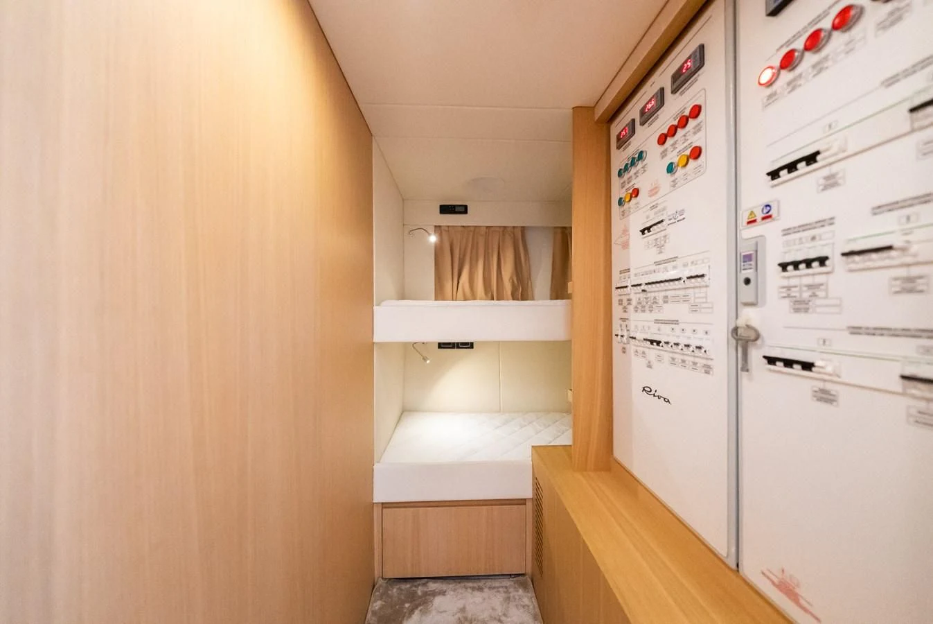 a room with a fridge and cabinets aboard BABY PEARL Yacht for Sale
