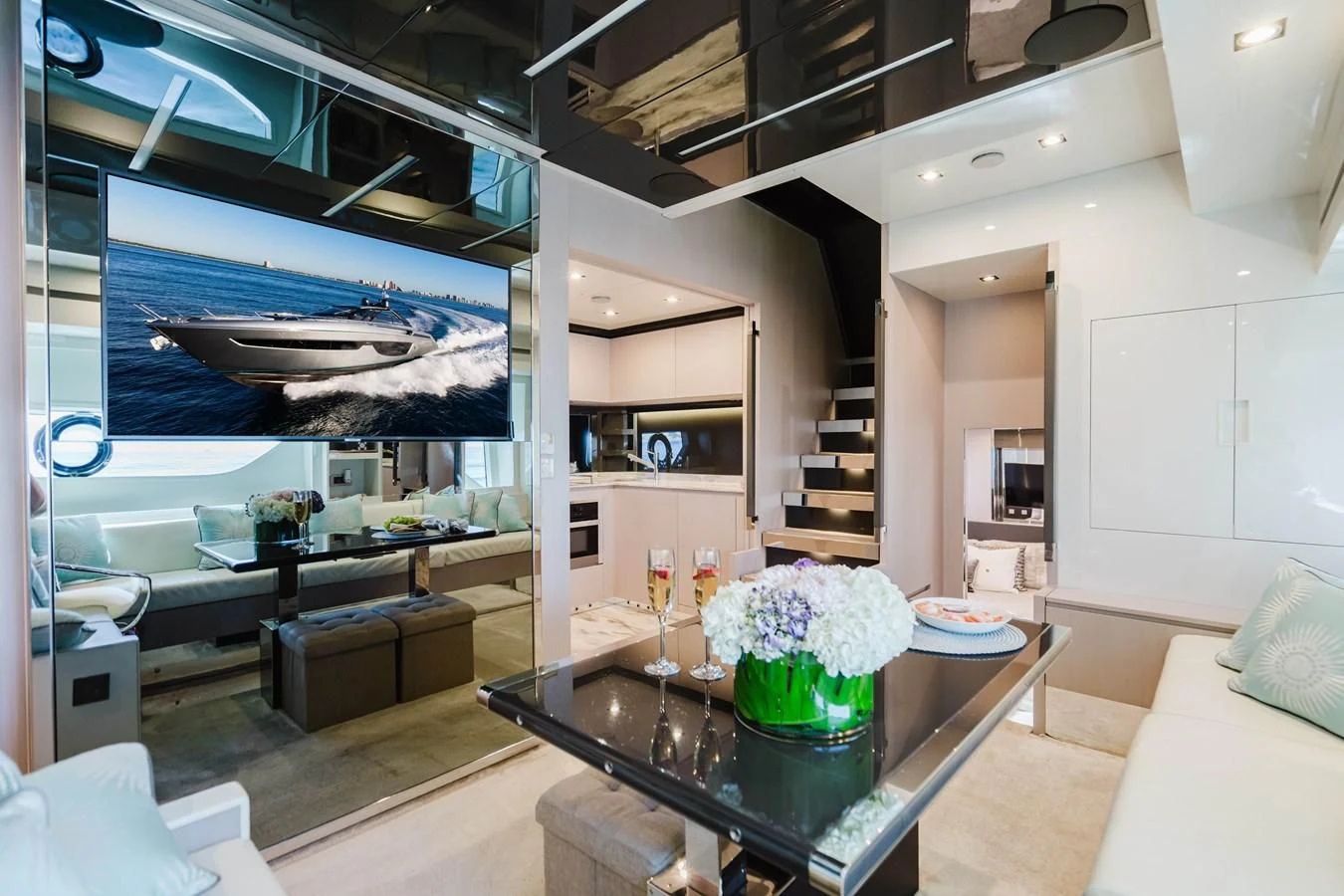 a room with a table and a fish tank aboard BABY PEARL Yacht for Sale