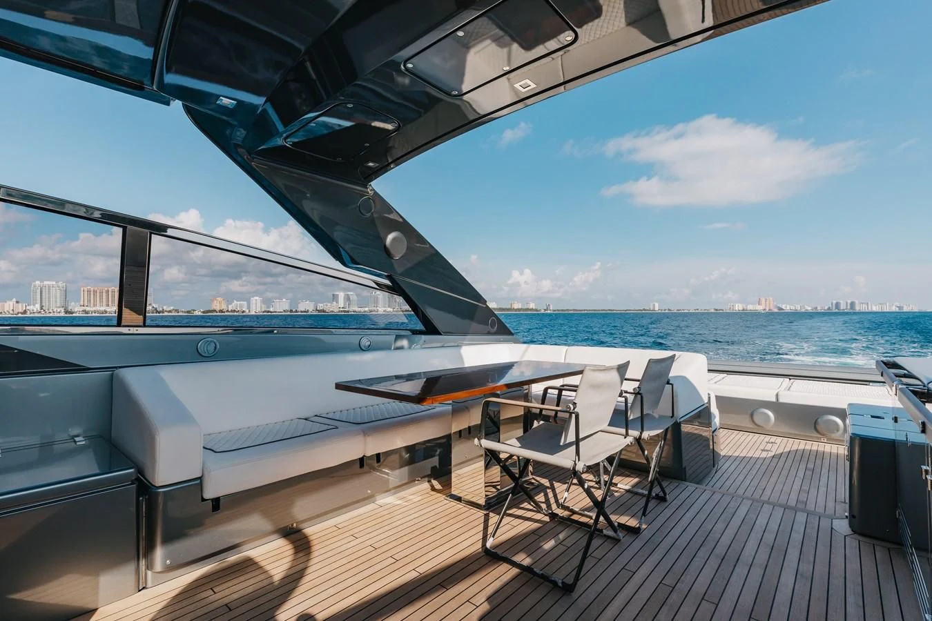 a deck with a large ship in the background aboard BABY PEARL Yacht for Sale