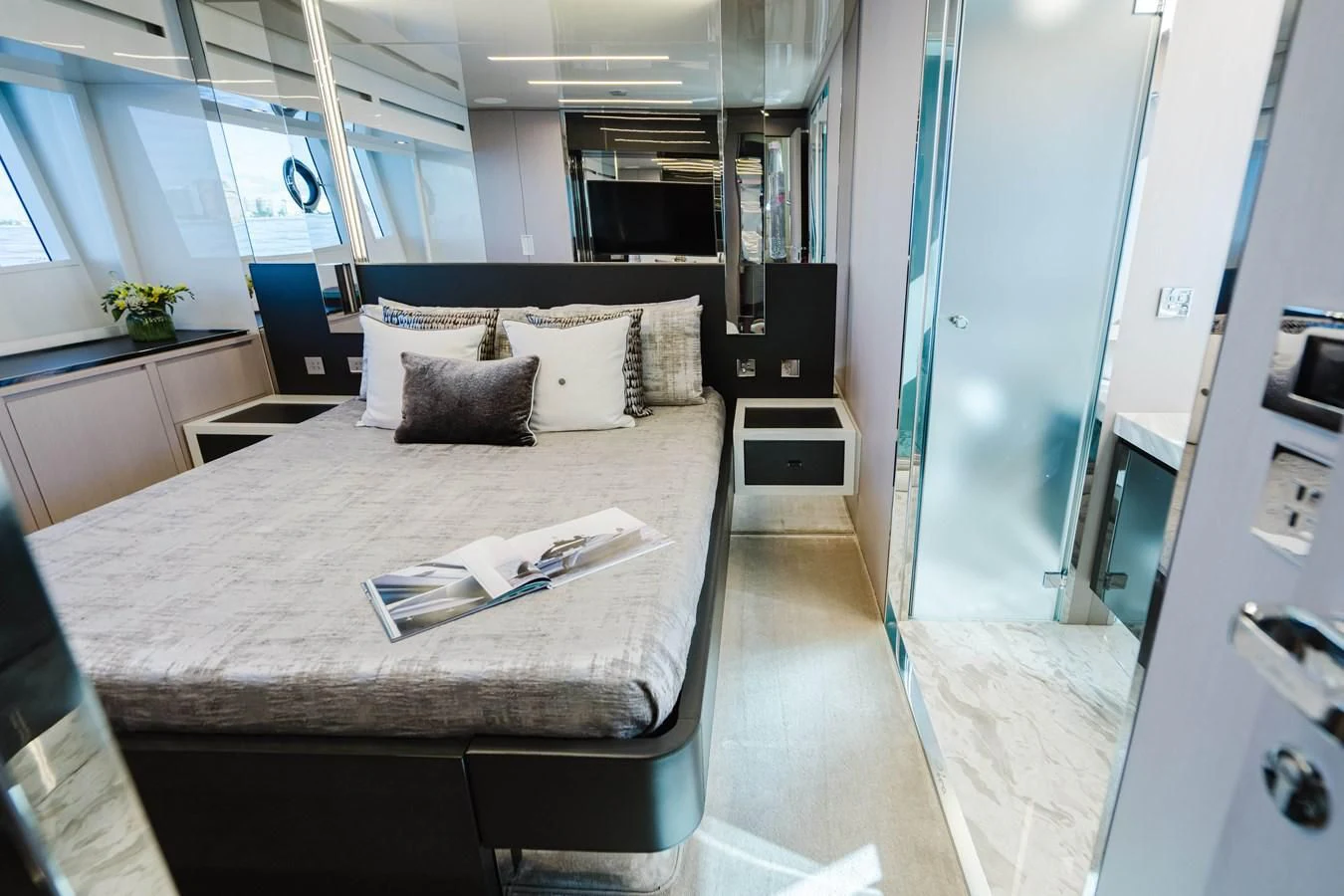 a bed in a room aboard BABY PEARL Yacht for Sale