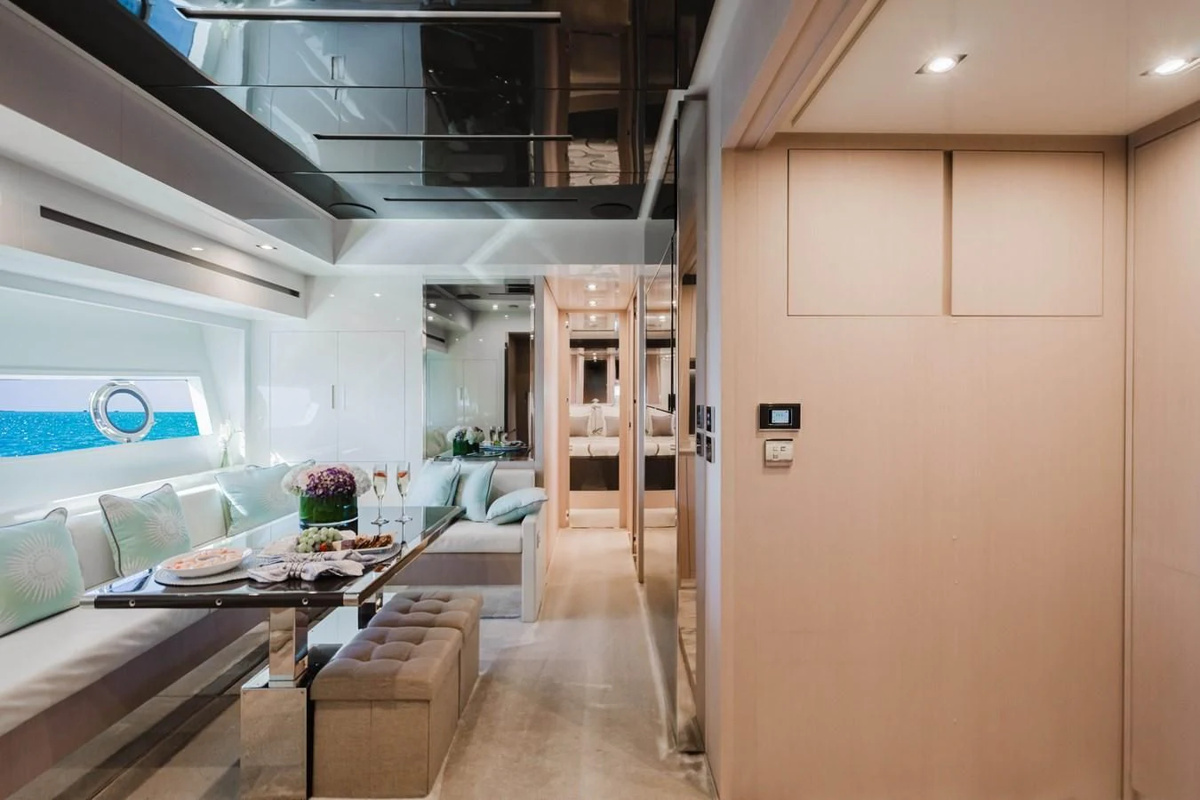 a room with a table and chairs aboard BABY PEARL Yacht for Sale