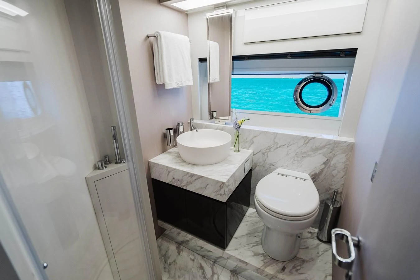 a bathroom with a toilet sink and a bathtub aboard BABY PEARL Yacht for Sale
