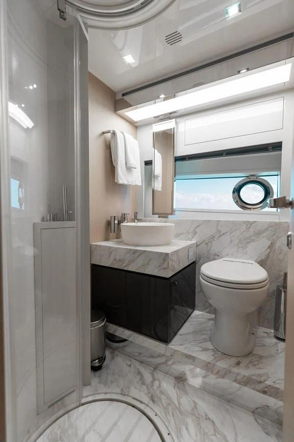 a bathroom with a sink and toilet aboard BABY PEARL Yacht for Sale