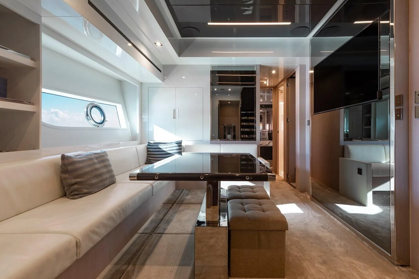 a room with a couch and a table aboard BABY PEARL Yacht for Sale