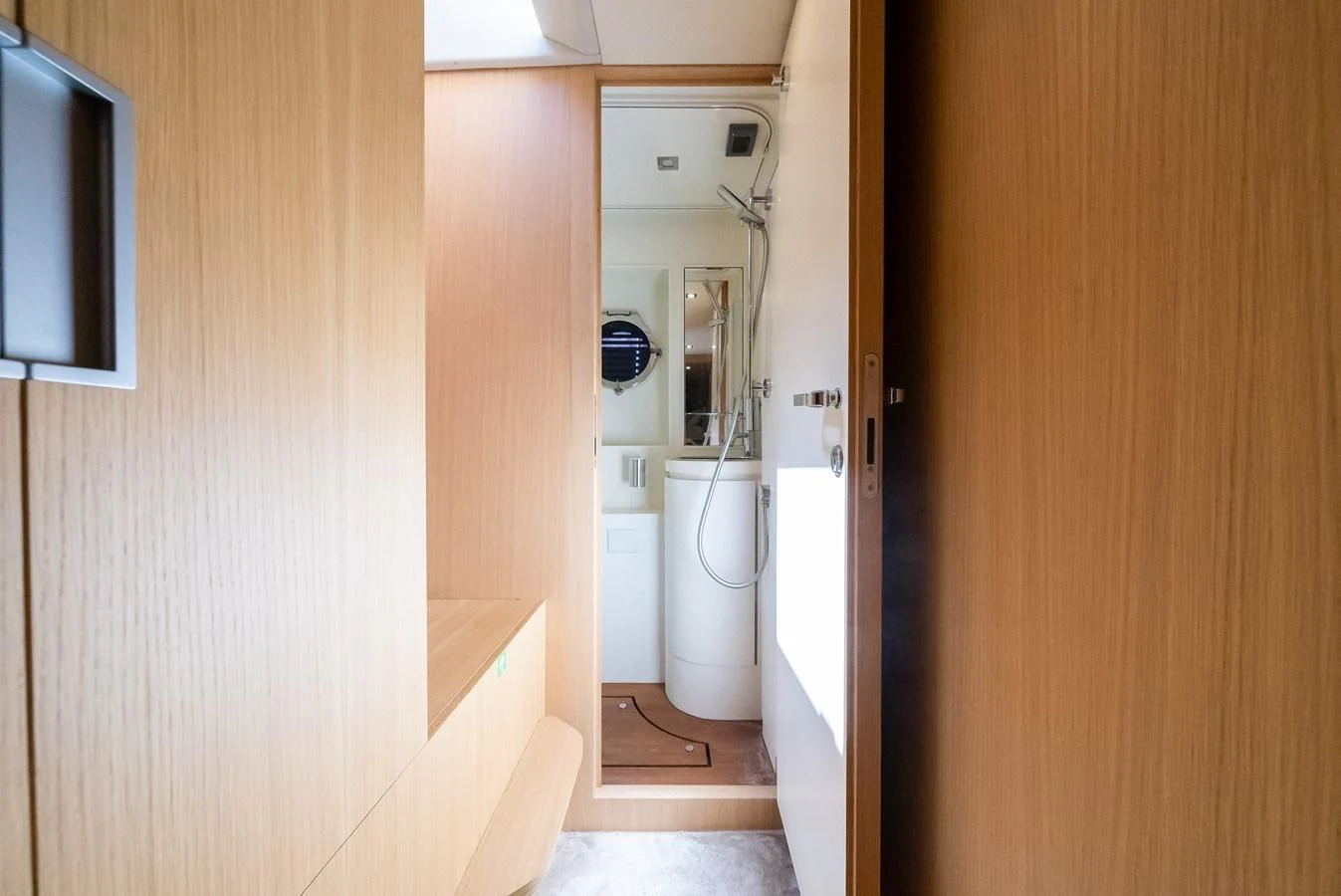 a bathroom with a toilet and a sink aboard BABY PEARL Yacht for Sale