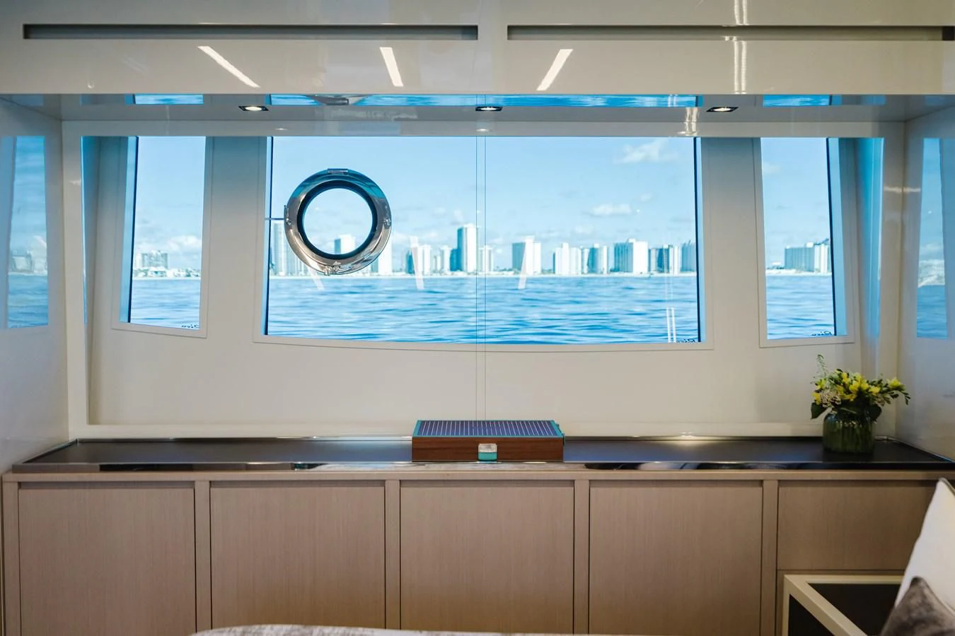 a room with a large window aboard BABY PEARL Yacht for Sale