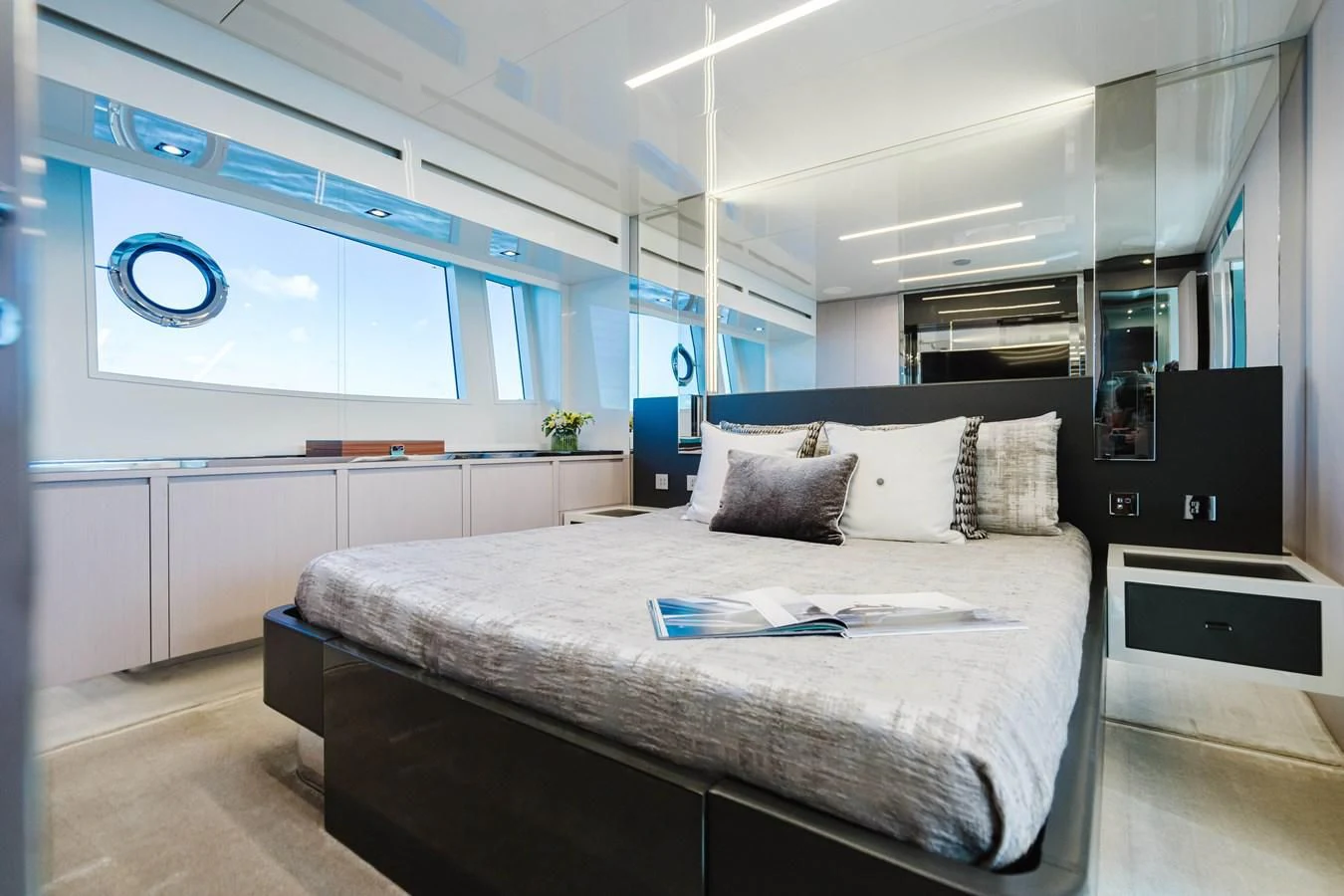 a room with a bed and a desk aboard BABY PEARL Yacht for Sale