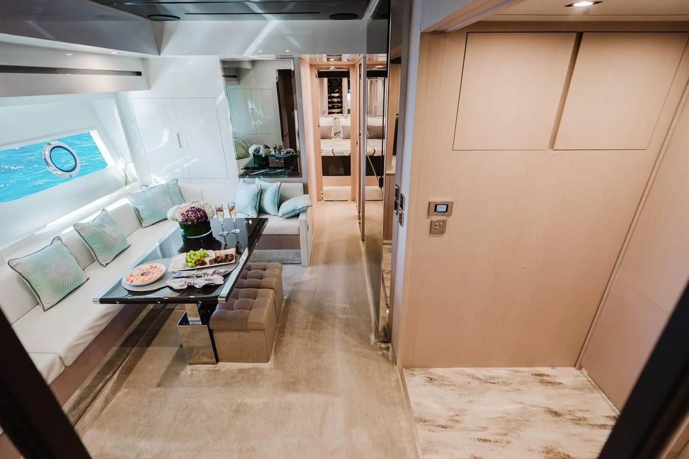 a room with a table and chairs aboard BABY PEARL Yacht for Sale