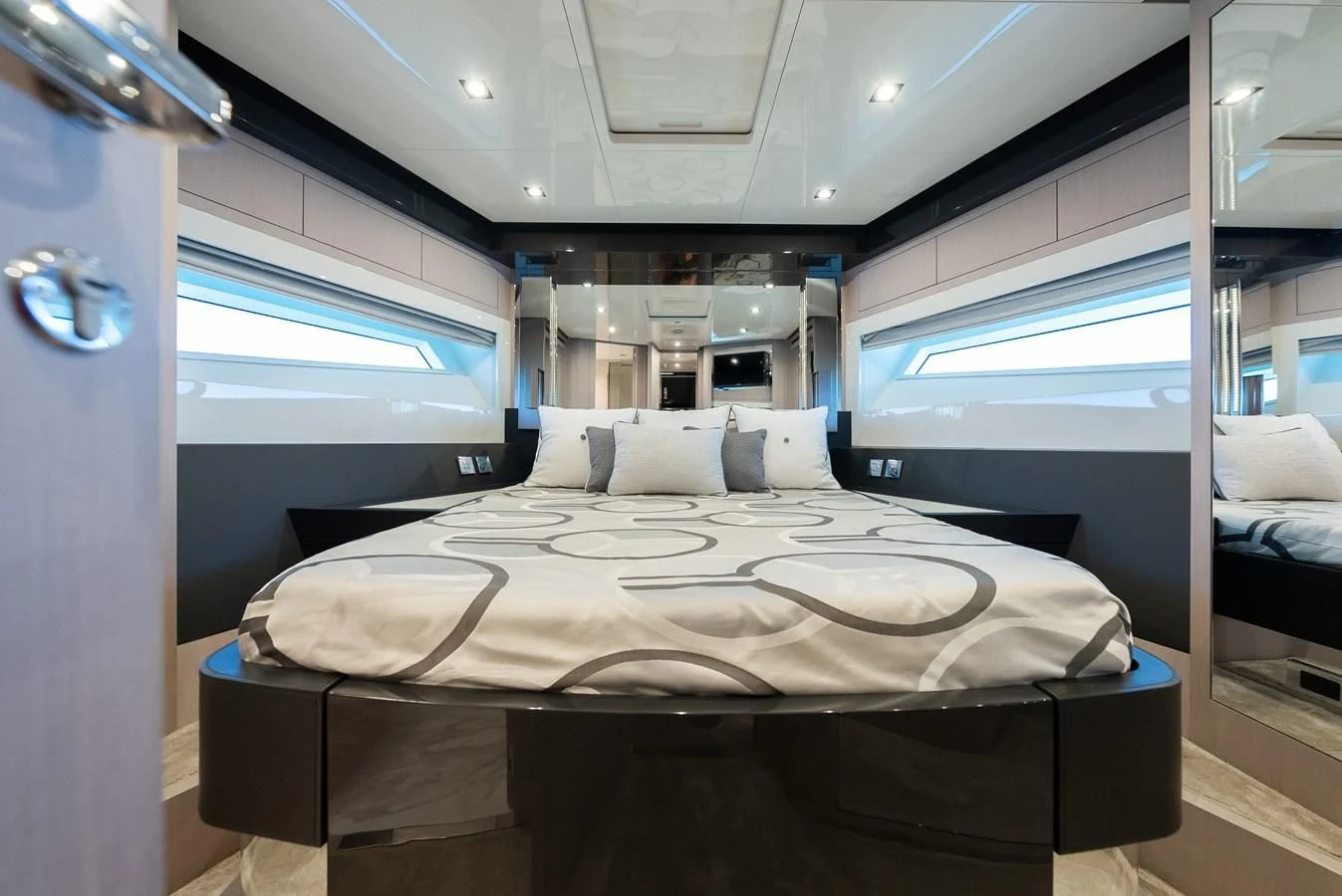 a bed in a room aboard BABY PEARL Yacht for Sale