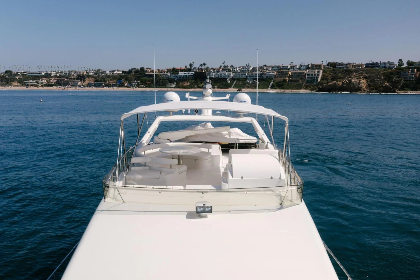 a white boat in the water aboard LIVING LIFE Yacht for Sale