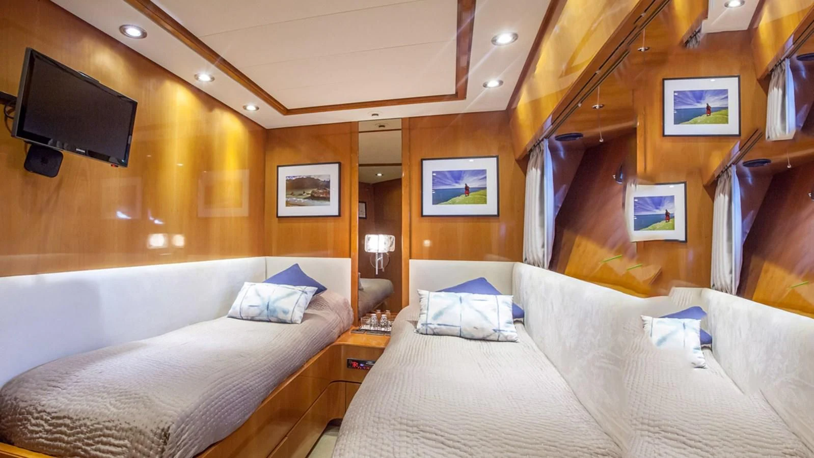 a room with two beds aboard SOLAL Yacht for Sale