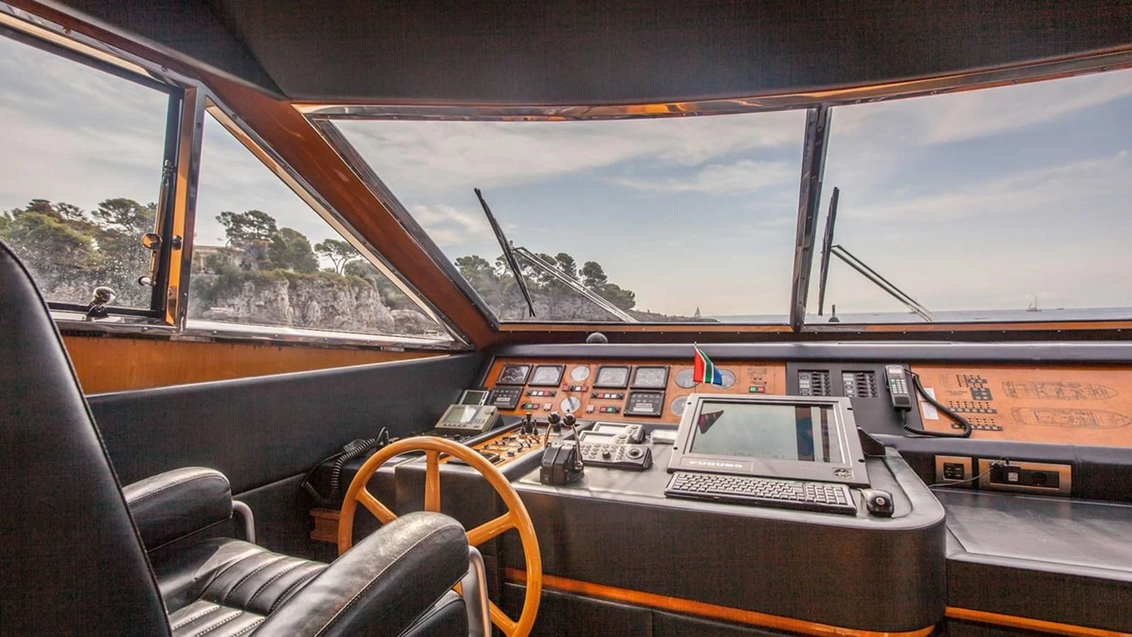 inside of a car aboard SOLAL Yacht for Sale