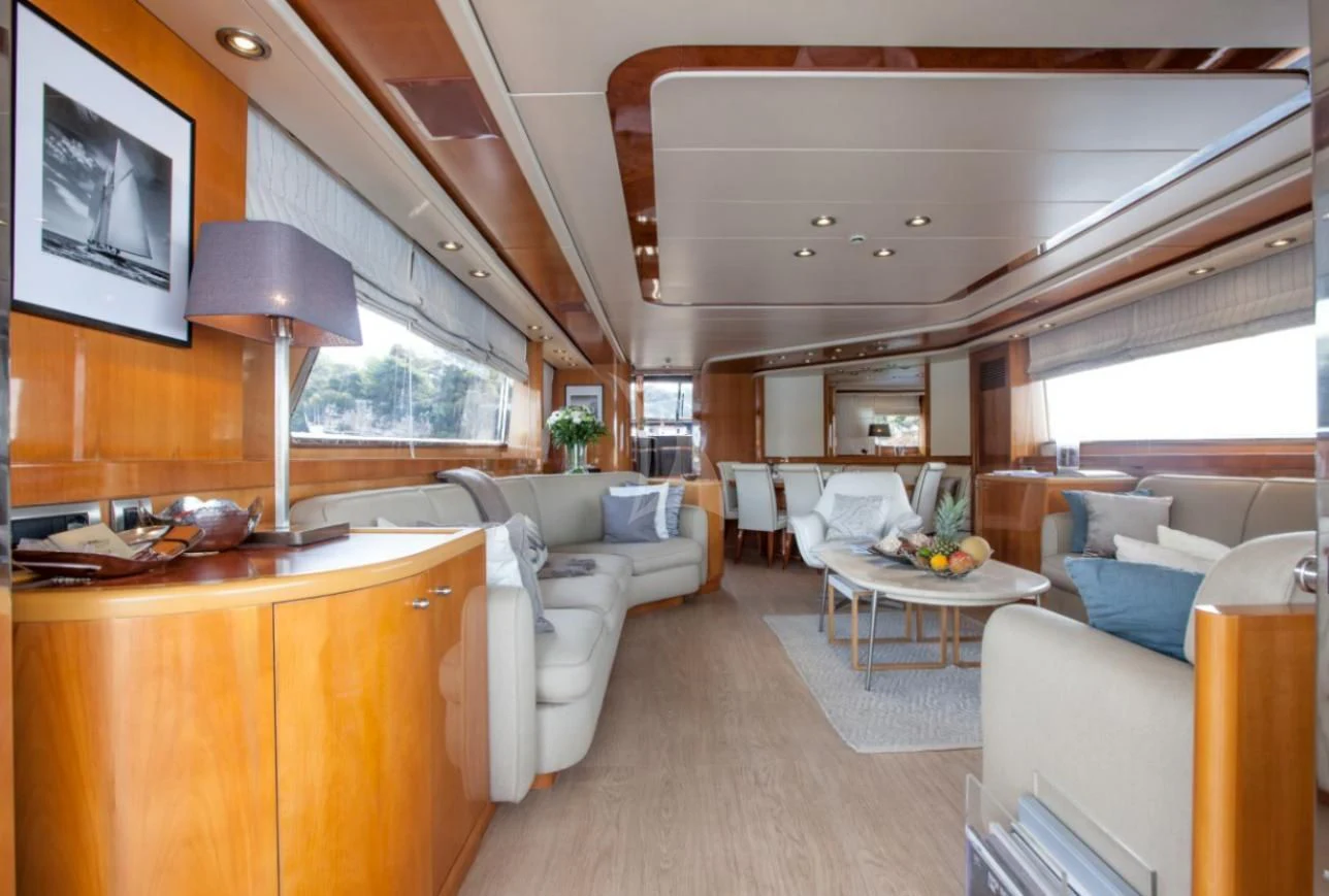 a living room with a large window aboard SOLAL Yacht for Sale
