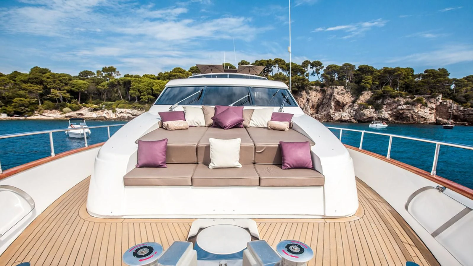 a bed on a balcony aboard SOLAL Yacht for Sale