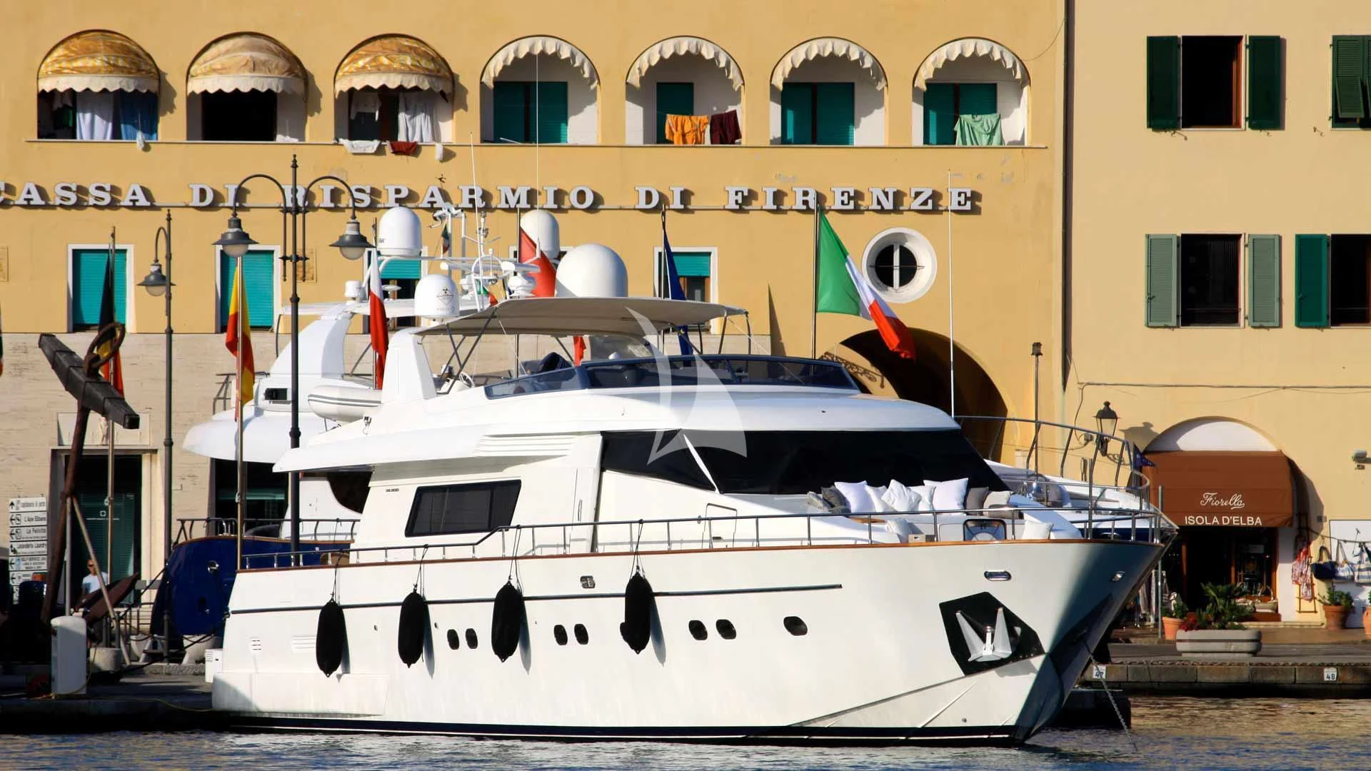 a boat in front of a building aboard SOLAL Yacht for Sale