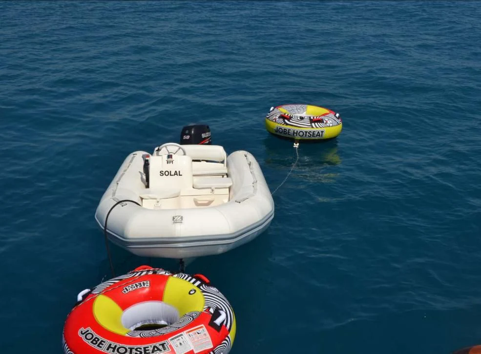 a couple of boats in the water aboard SOLAL Yacht for Sale