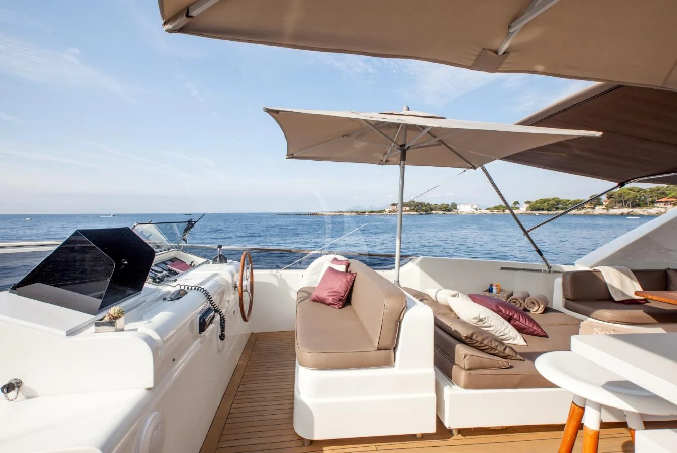 a lounge chair on a boat aboard SOLAL Yacht for Sale