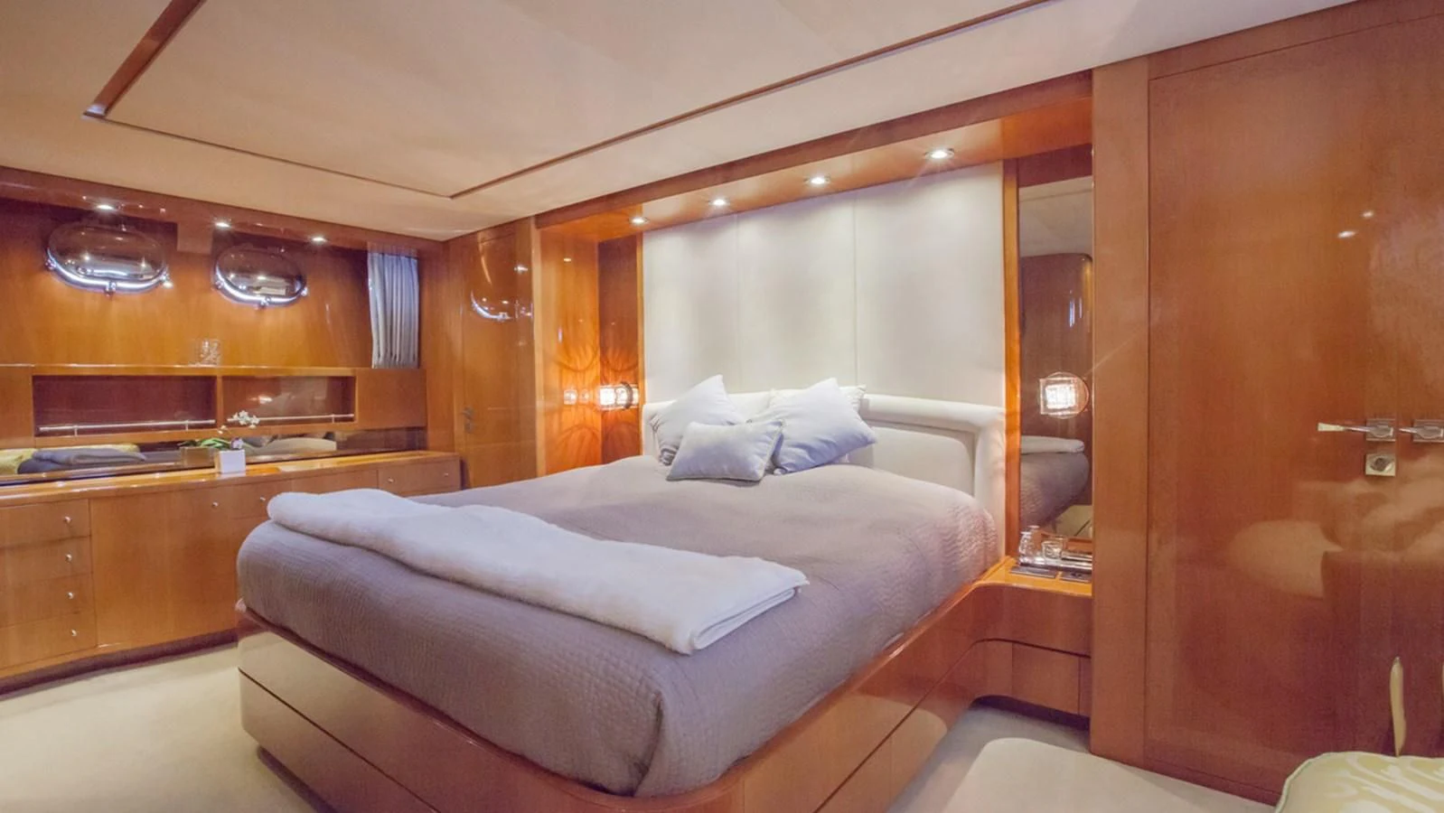 a bed in a room aboard SOLAL Yacht for Sale