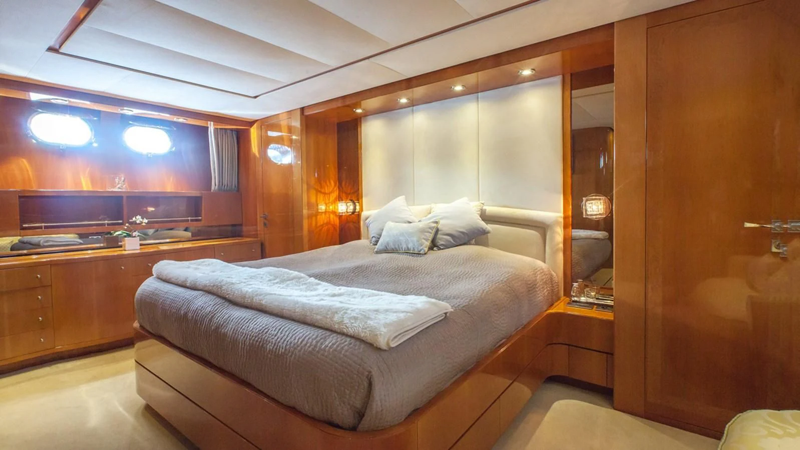 a bed in a room aboard SOLAL Yacht for Sale