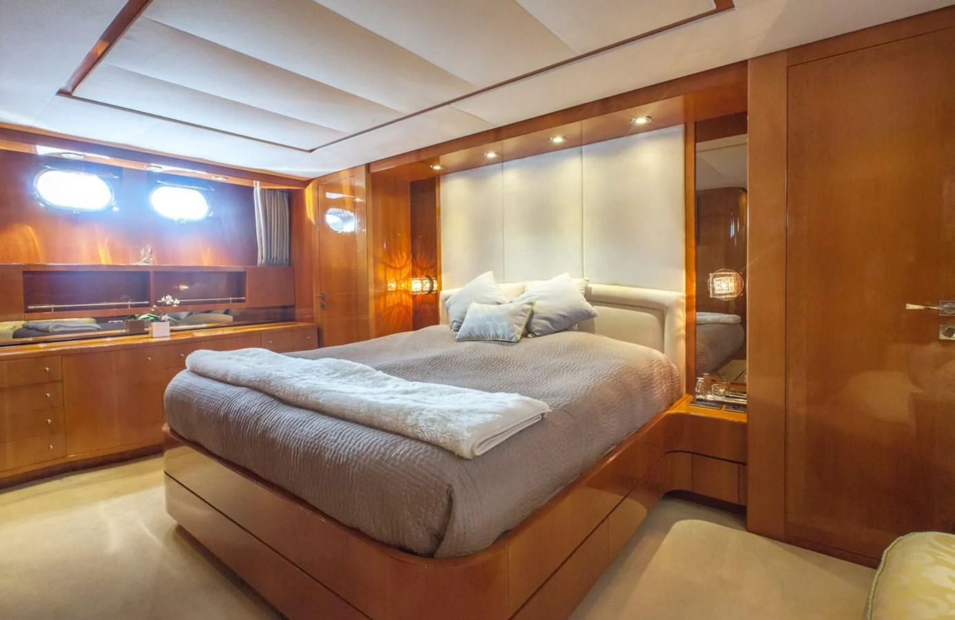a bed in a room aboard SOLAL Yacht for Sale