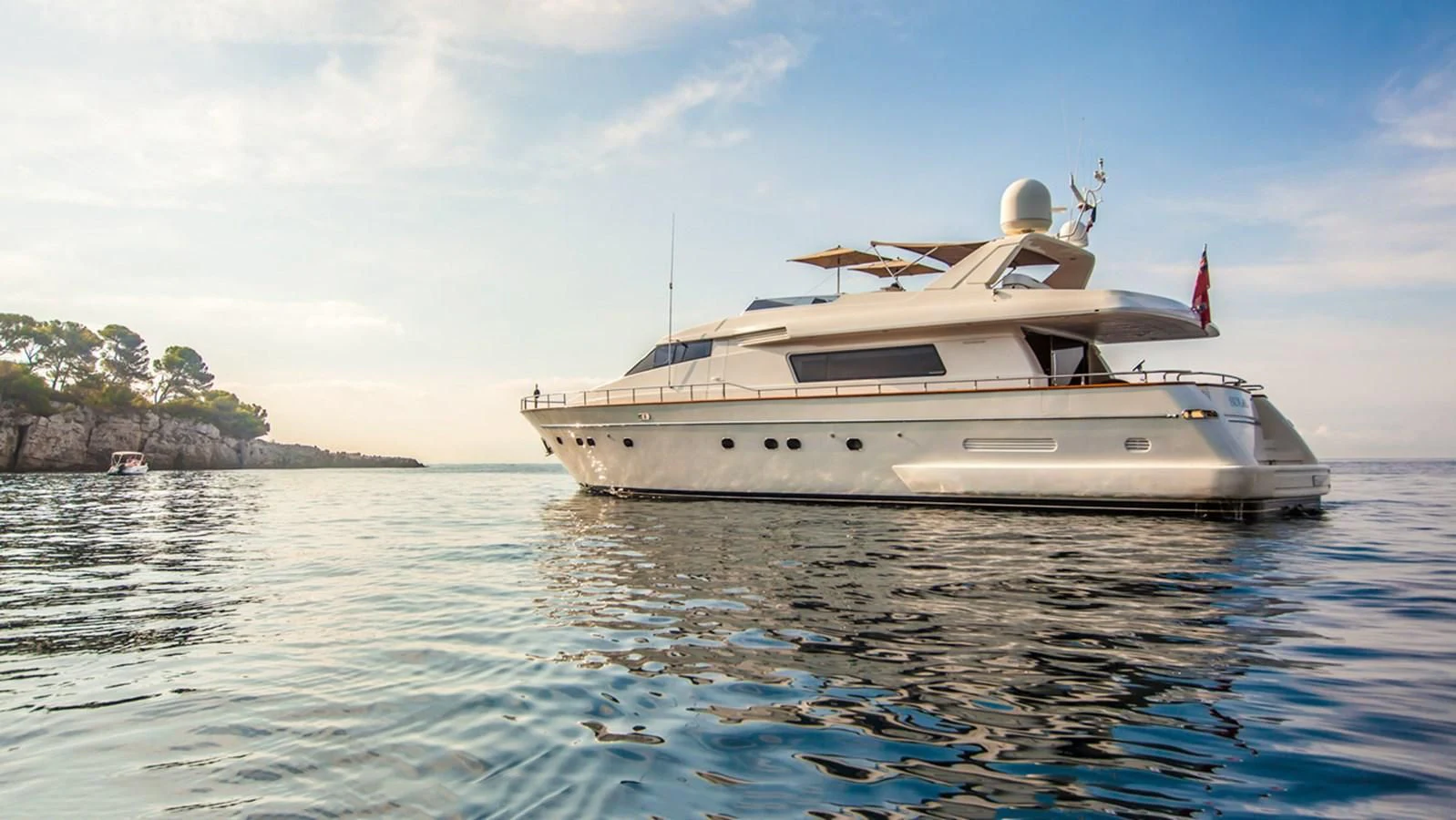 a white boat in the water aboard SOLAL Yacht for Sale