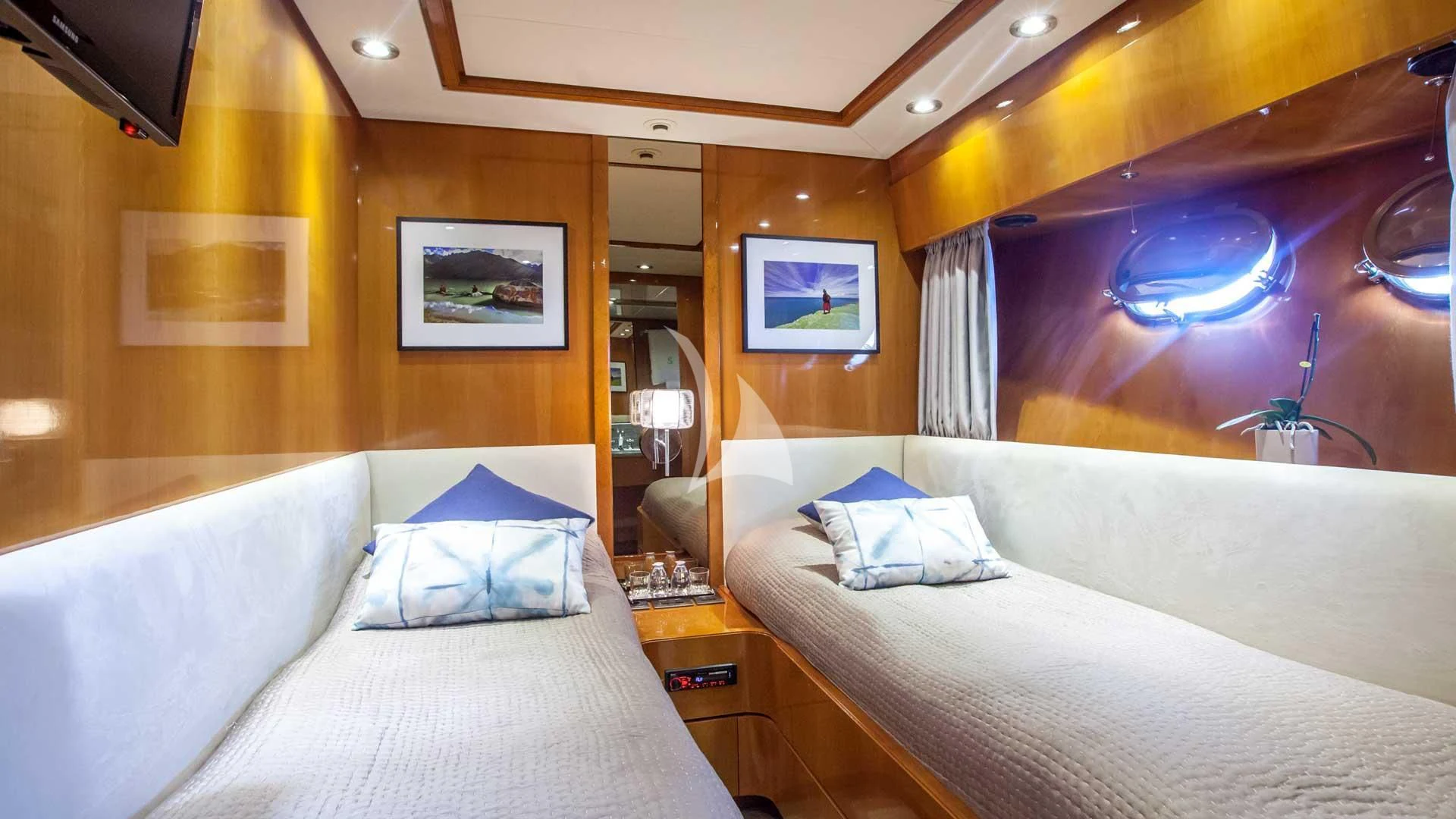 a room with two beds aboard SOLAL Yacht for Sale
