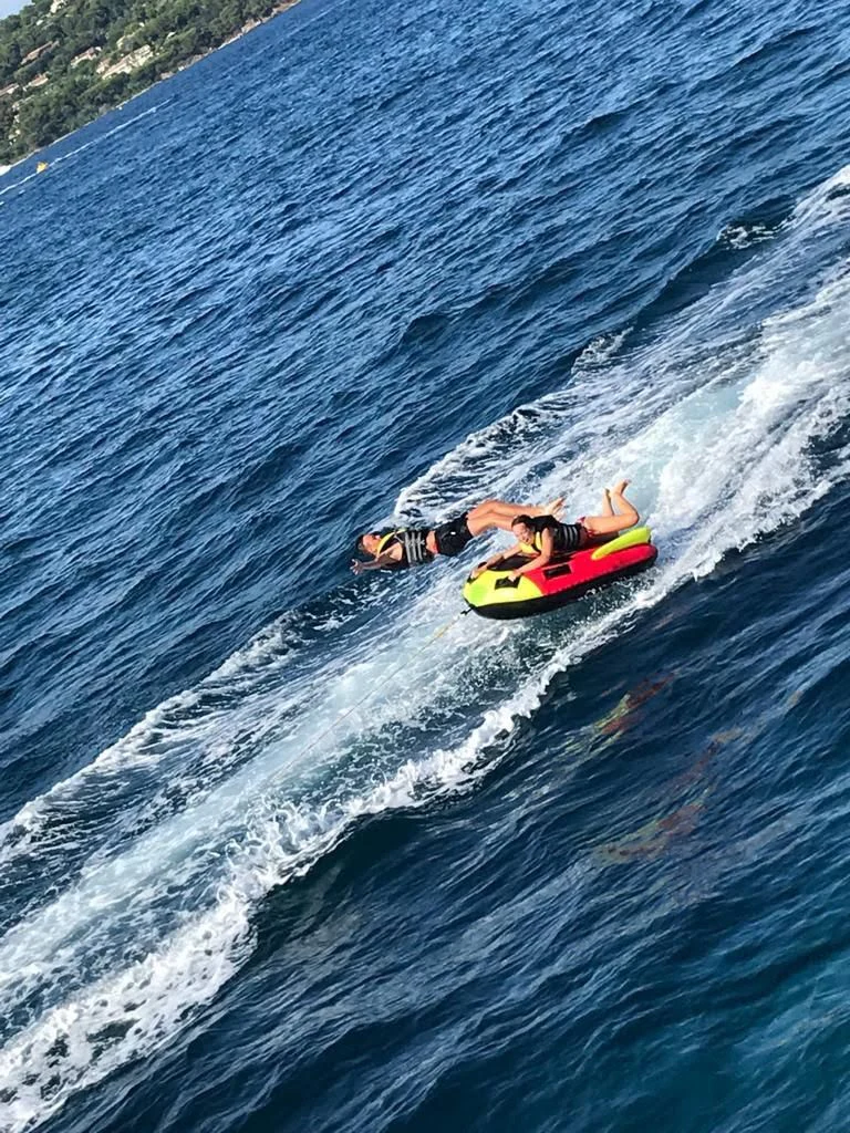 a man on a jet ski aboard SOLAL Yacht for Sale