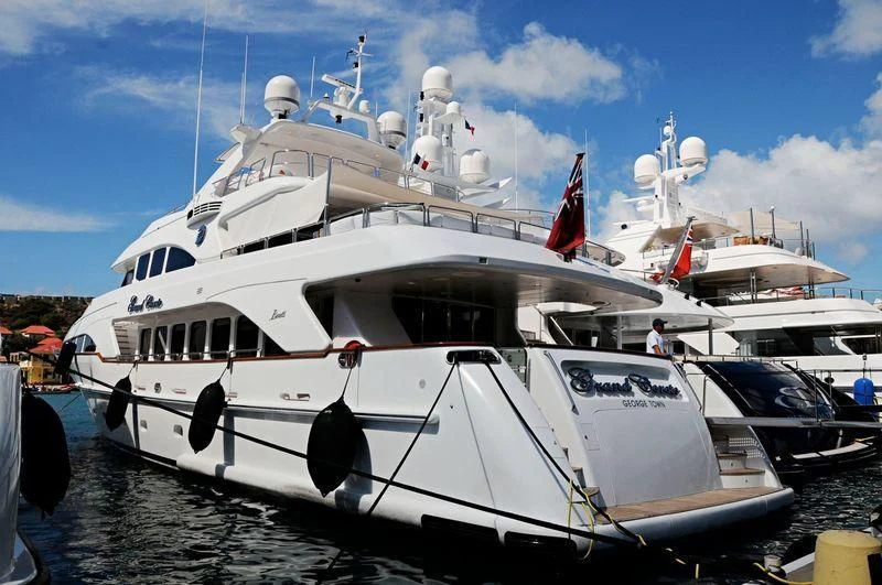 a large white boat aboard CAMARINA ROYALE Yacht for Sale