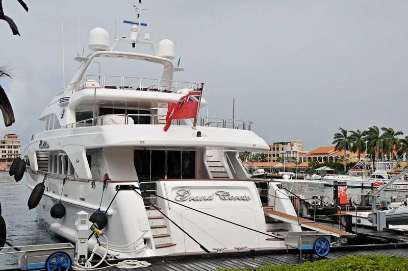 a white boat docked aboard CAMARINA ROYALE Yacht for Sale