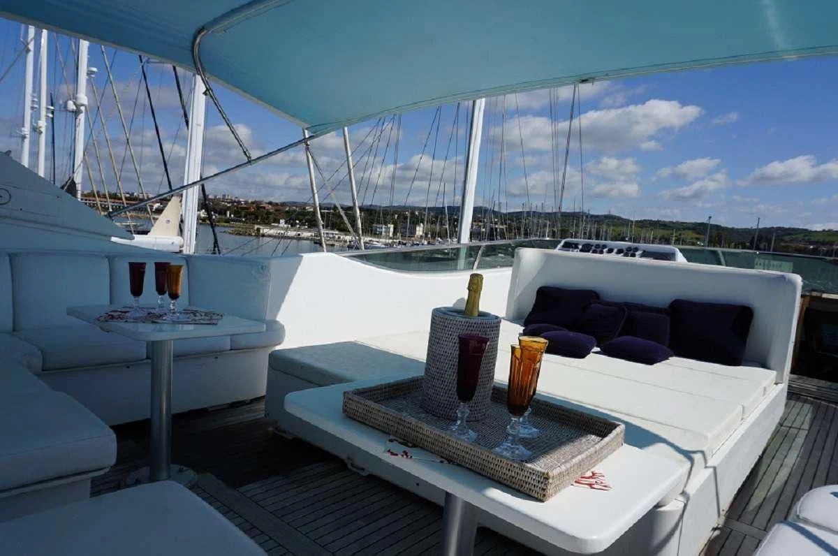 a table with drinks on it aboard BALU 3 Yacht for Sale