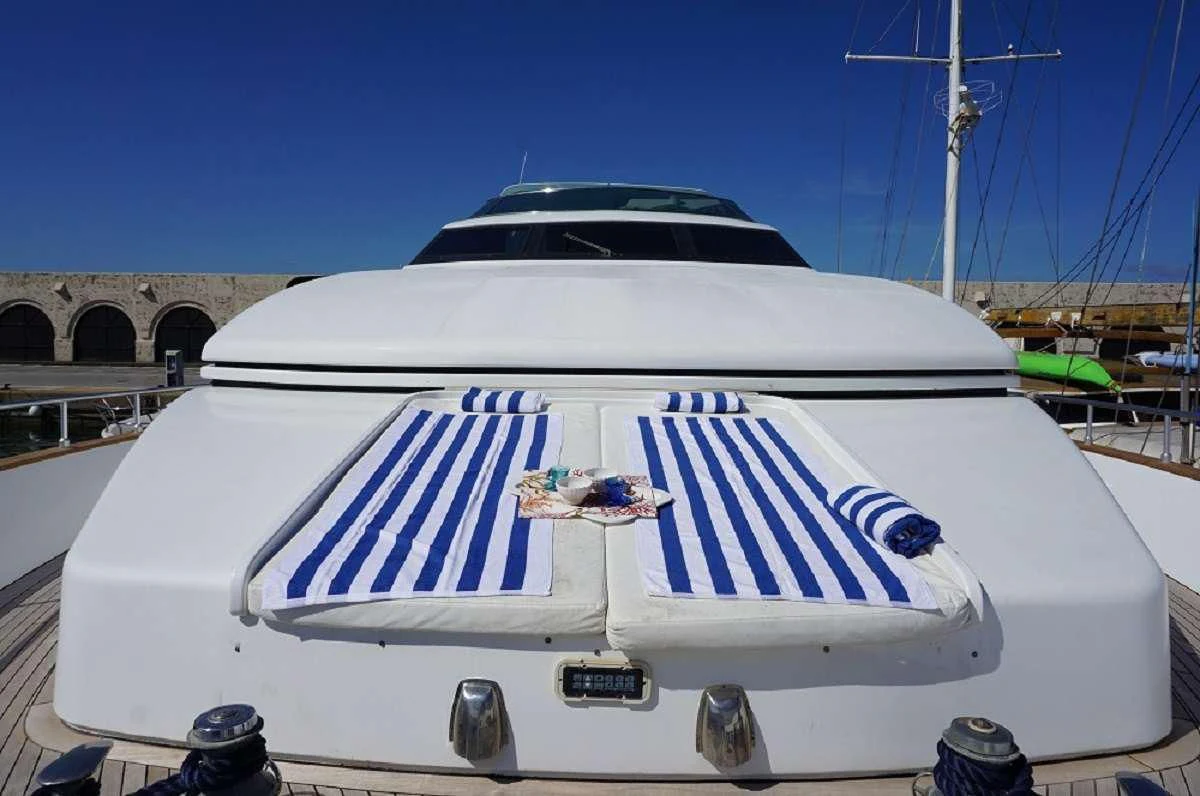 a white yacht in a dock aboard BALU 3 Yacht for Sale